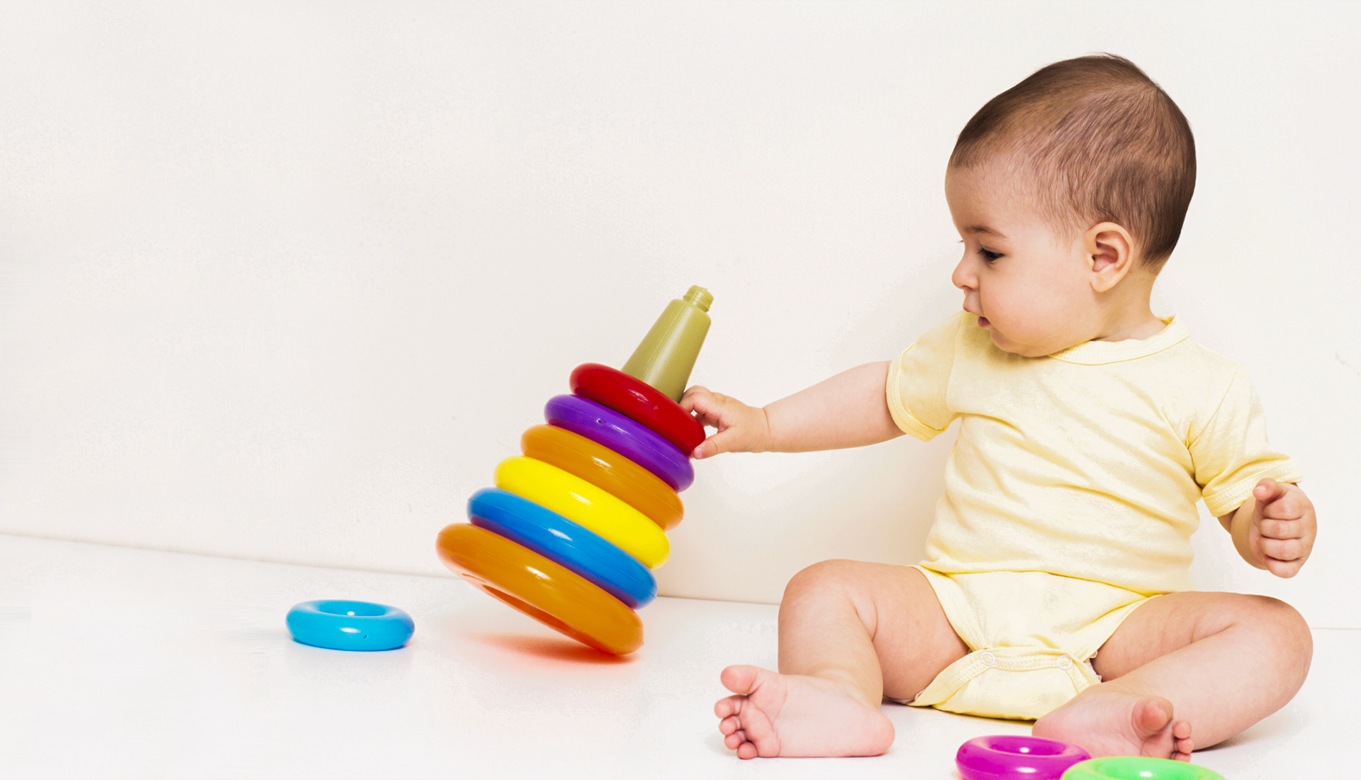 Child playing with learning toys
